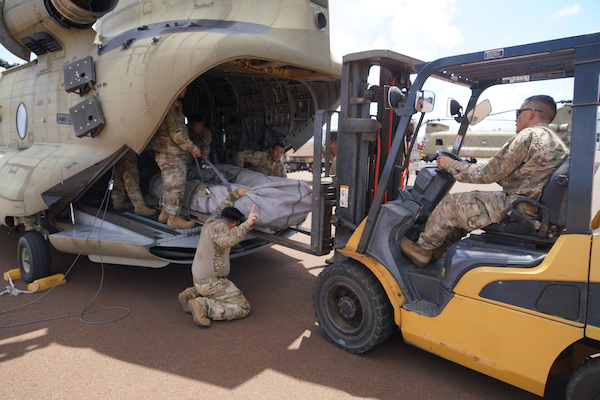 Two Hawaii Army National Guard CH47 Chinook perform aerial water bucket drops on the Island of Maui to assist the fight of wildfires, Maui, Hawaii