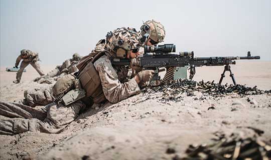 Service Members in action in the desert