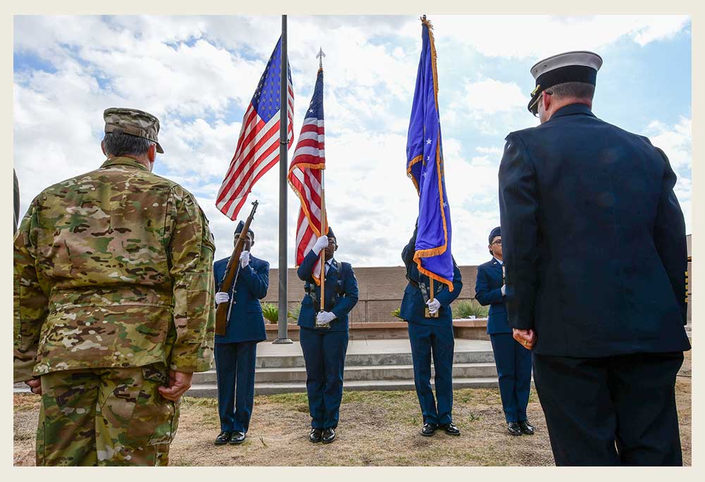 Service members conducting a ceremony