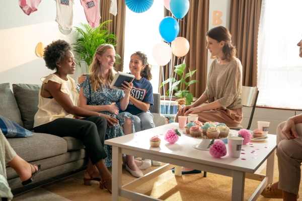 Bridget enjoying a baby shower hosted by USO volunteers and staff