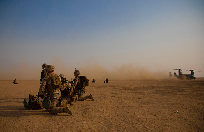 Service members in the desert