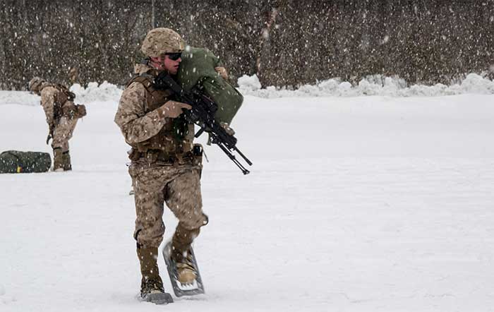 Service members in the snow