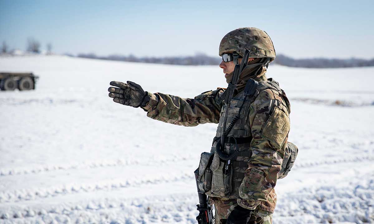 Service member in the snow