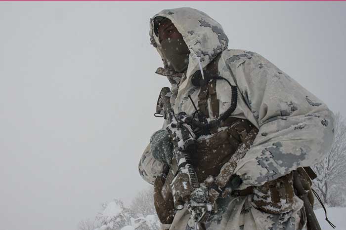 Service member in the snow